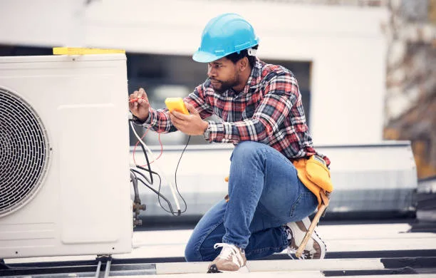 Air conditioning unit being serviced on a Toronto rooftop