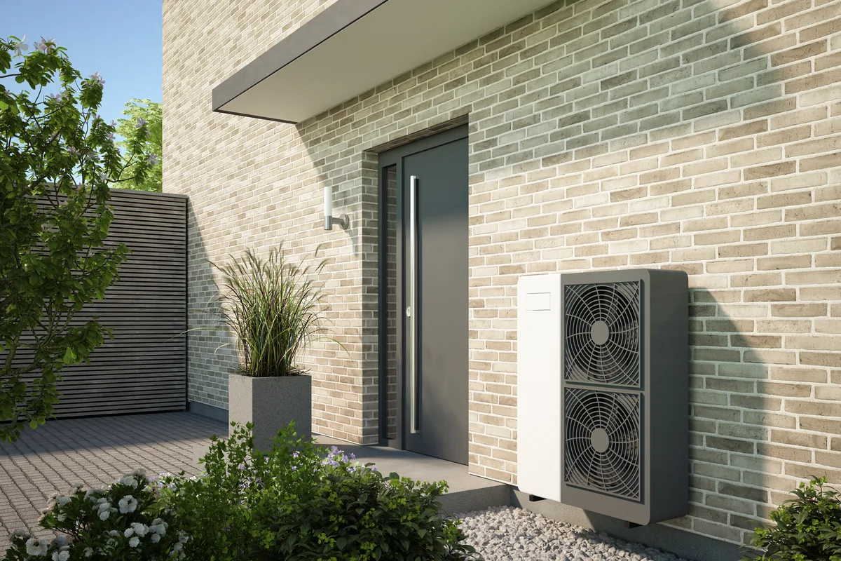 Modern house with an outdoor heat pump unit